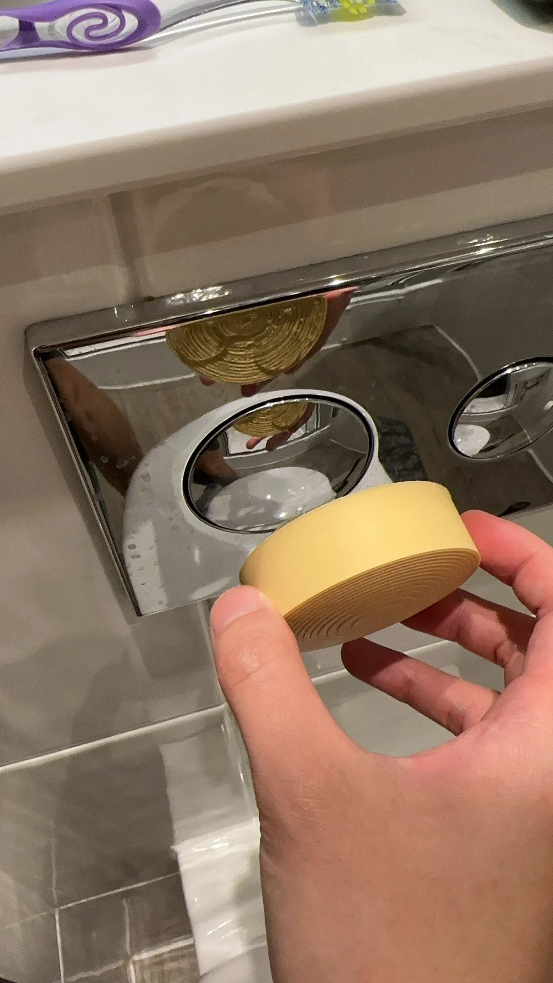 Toilet button thickening pad