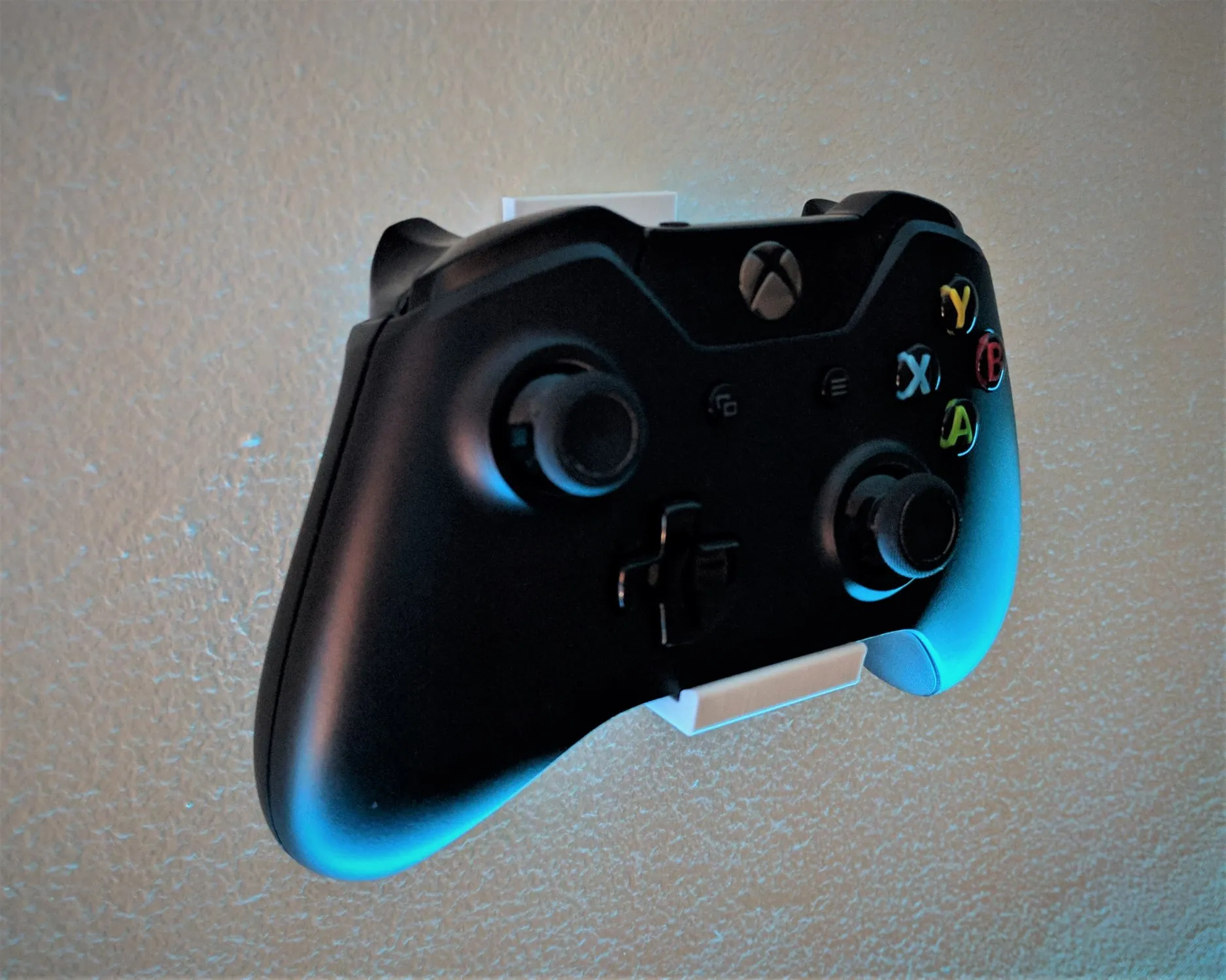 Xbox one controller mount with wall mounting holes
