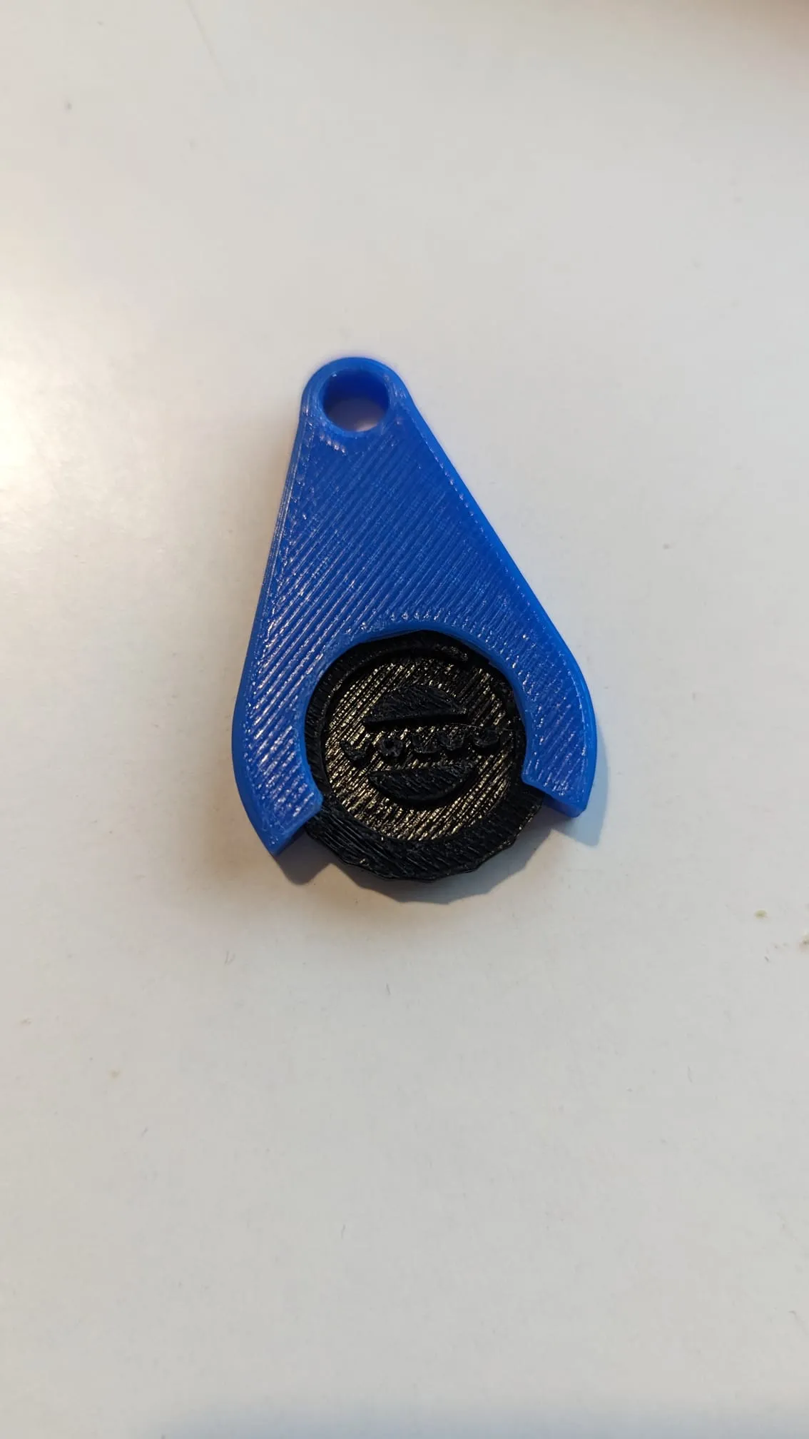 Tiêu đề Móc khóa đồng xu Plus Tóm tắt Đồng xu nhỏ có kích