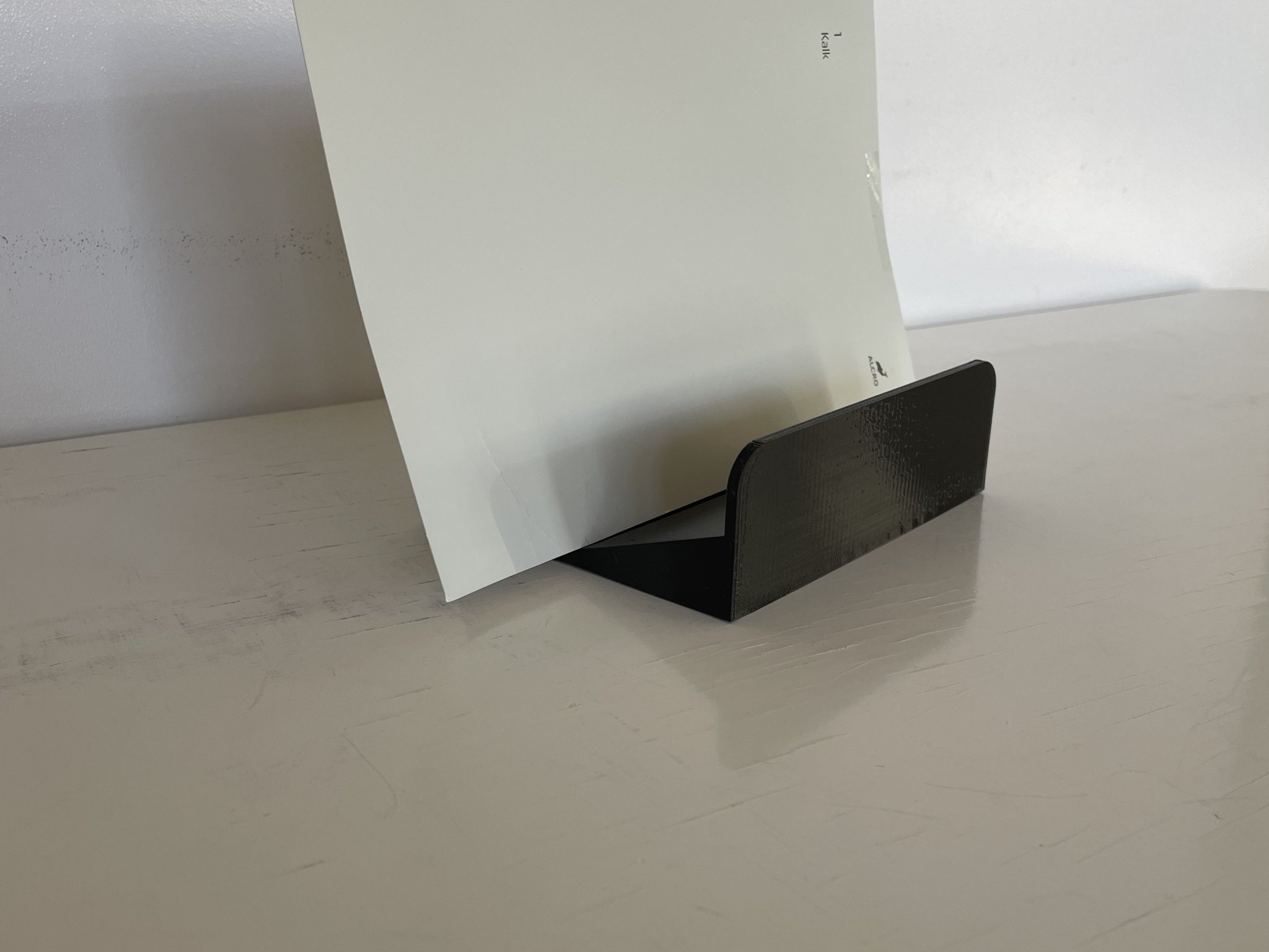 Chân đế đựng tờ rơi