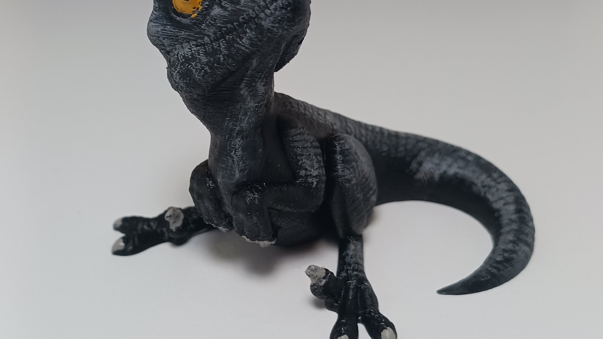 Tiêu đề Cute Baby Velociraptor-High Detail Tóm tắt Một ngón tay có