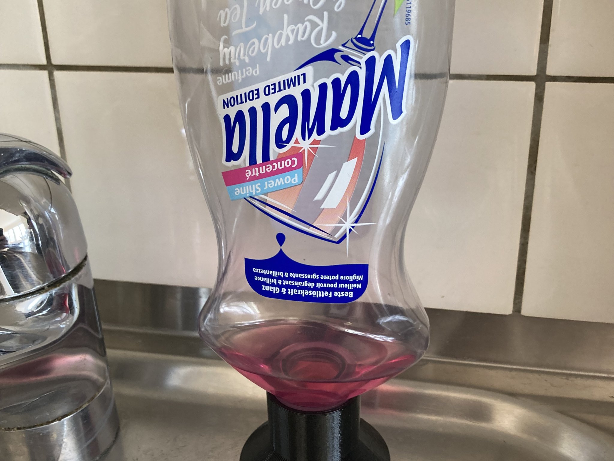 Upside down dishwashing liquid holder