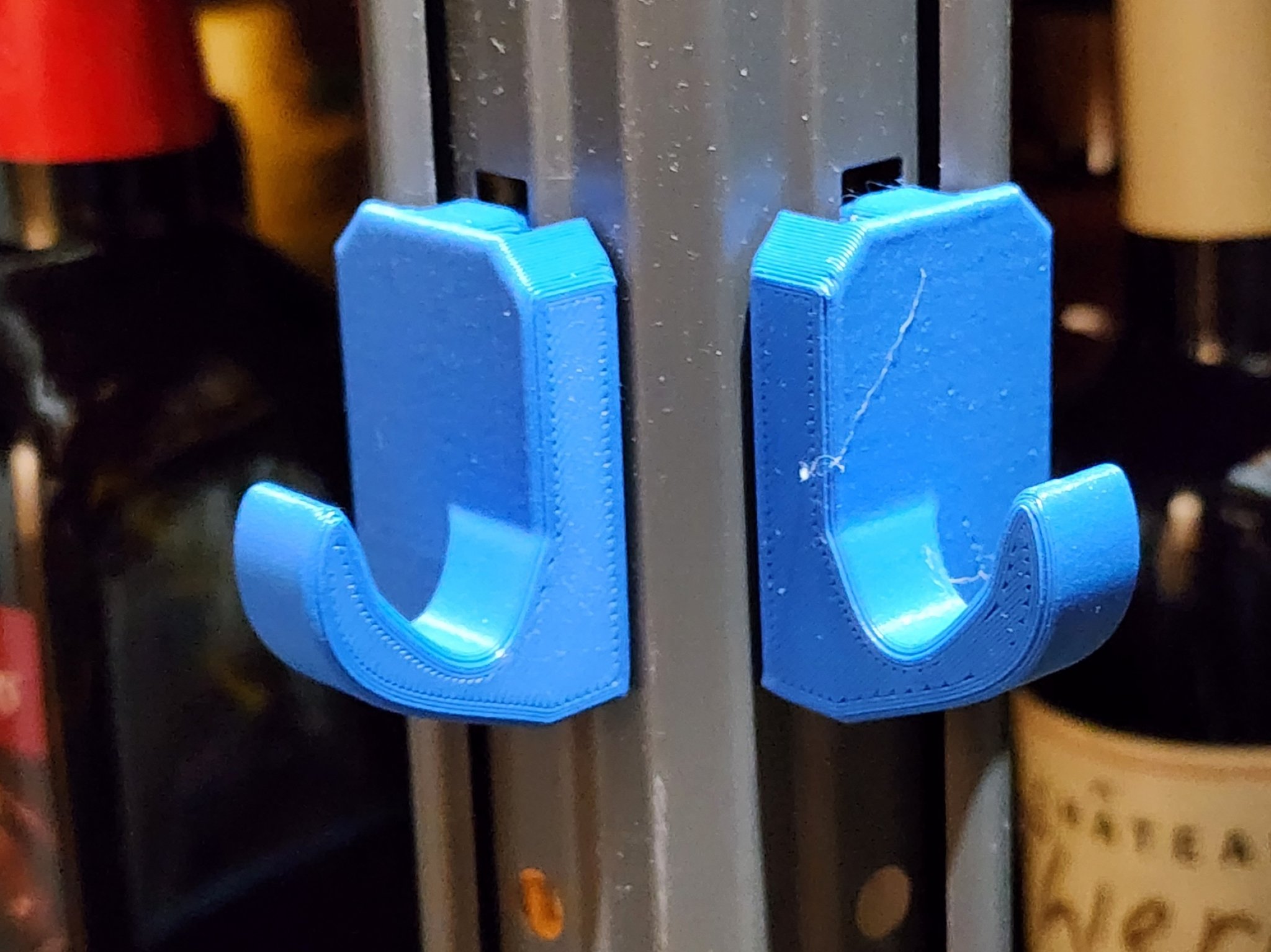 Hooks for utility shelves