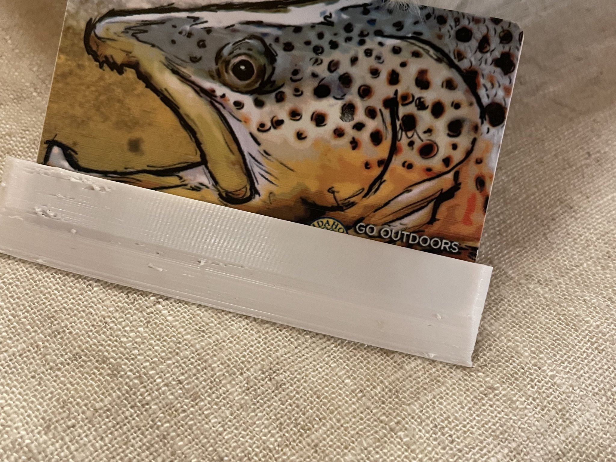 Card scrapper attachment