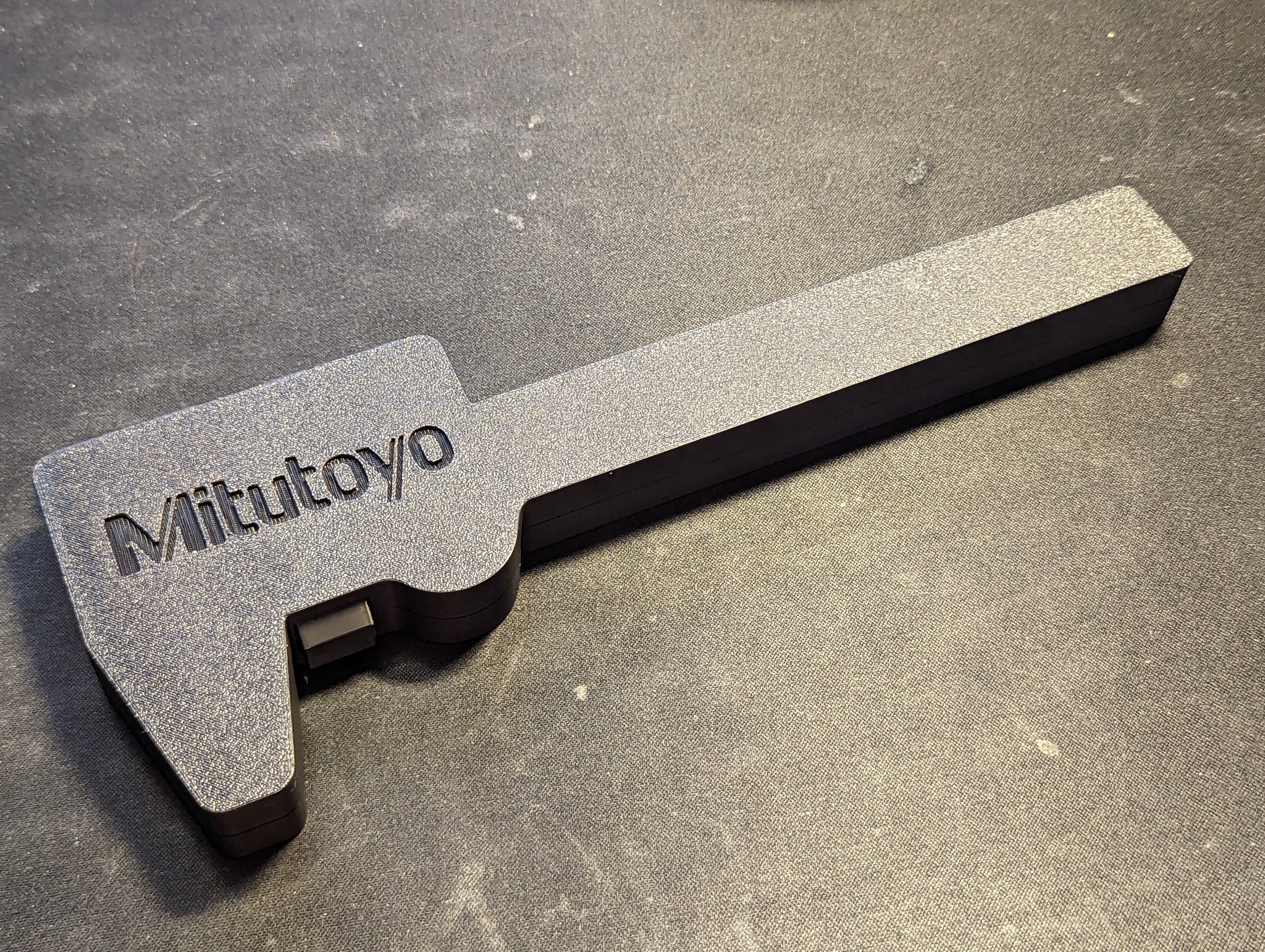 Tiêu đề Digital Caliper Case Mitutoyo logo thay đổi phông chữ Tóm t