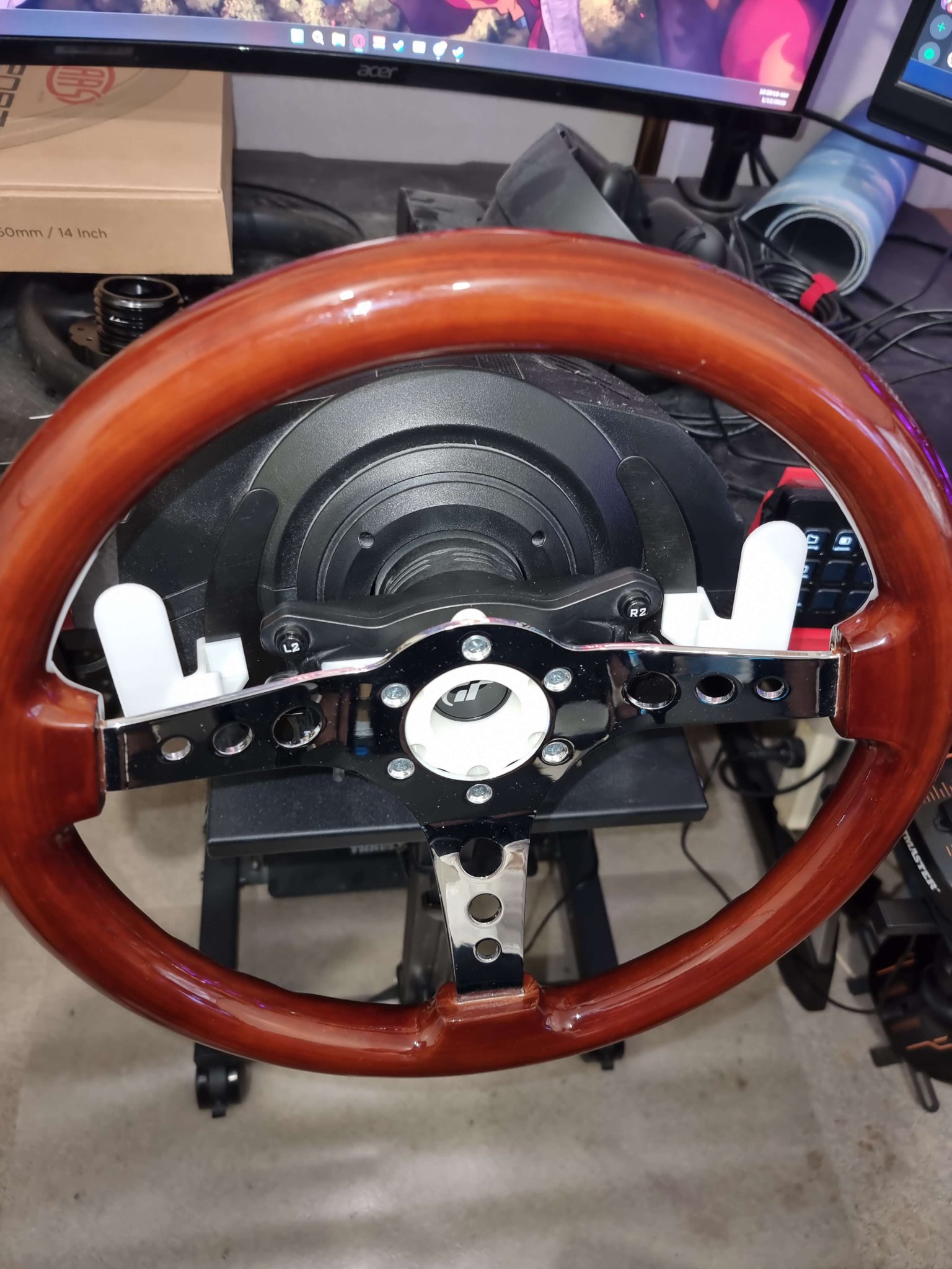 Thrustmaster T300 Wheel adaptor (with directional pad holder) + Paddle shifters.