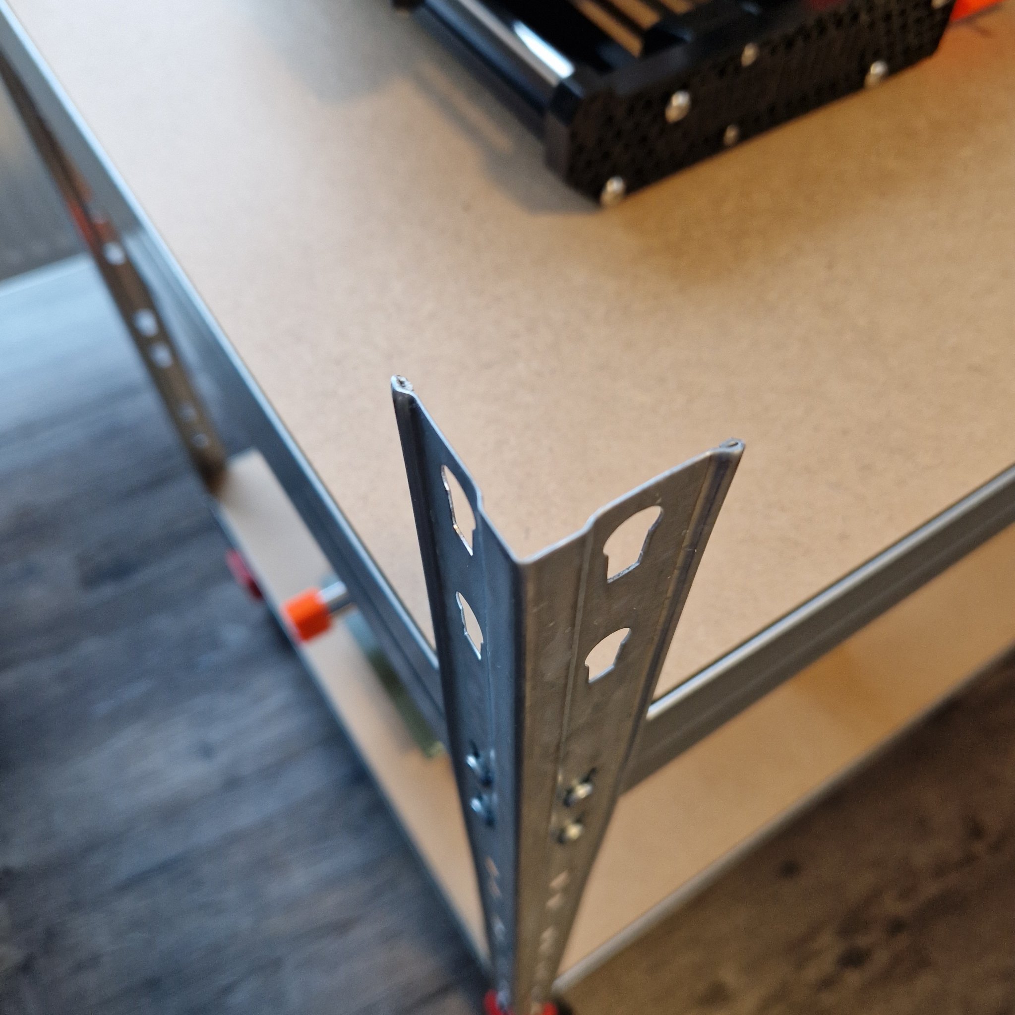 Cover cap for a heavy-duty shelf