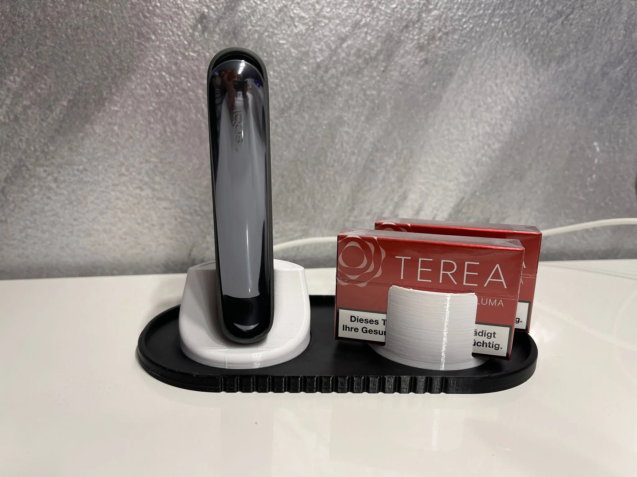 Tiêu đề Trạm sạc IQOS Iluma Tóm tắt trạm sạc ba phần cho IQO