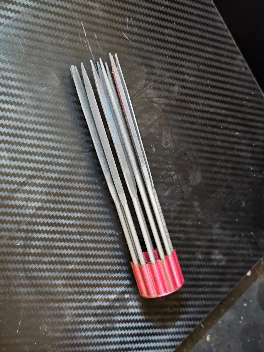 Cần chỗ đựng dũa kim