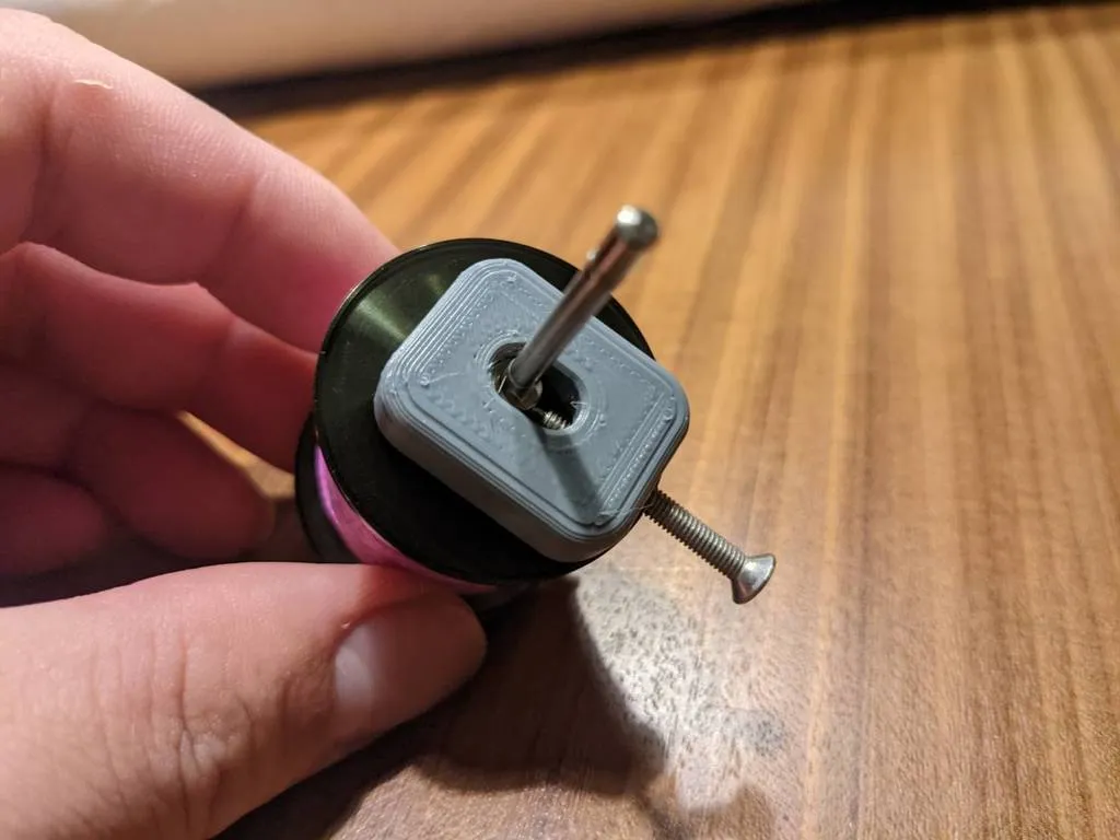 Dụng cụ tháo chốt trục cuộn dây câu cá