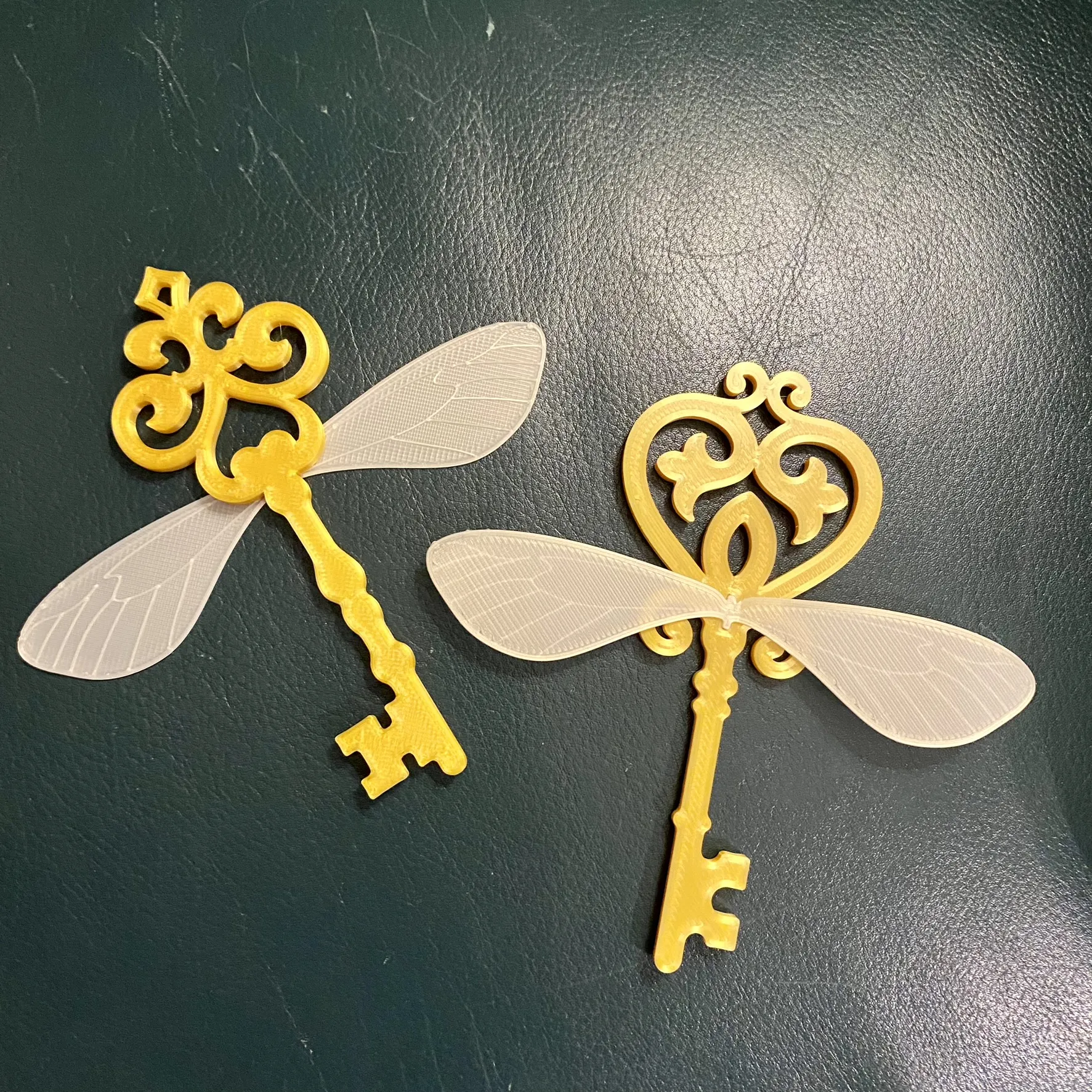 Winged key Christmas ornaments