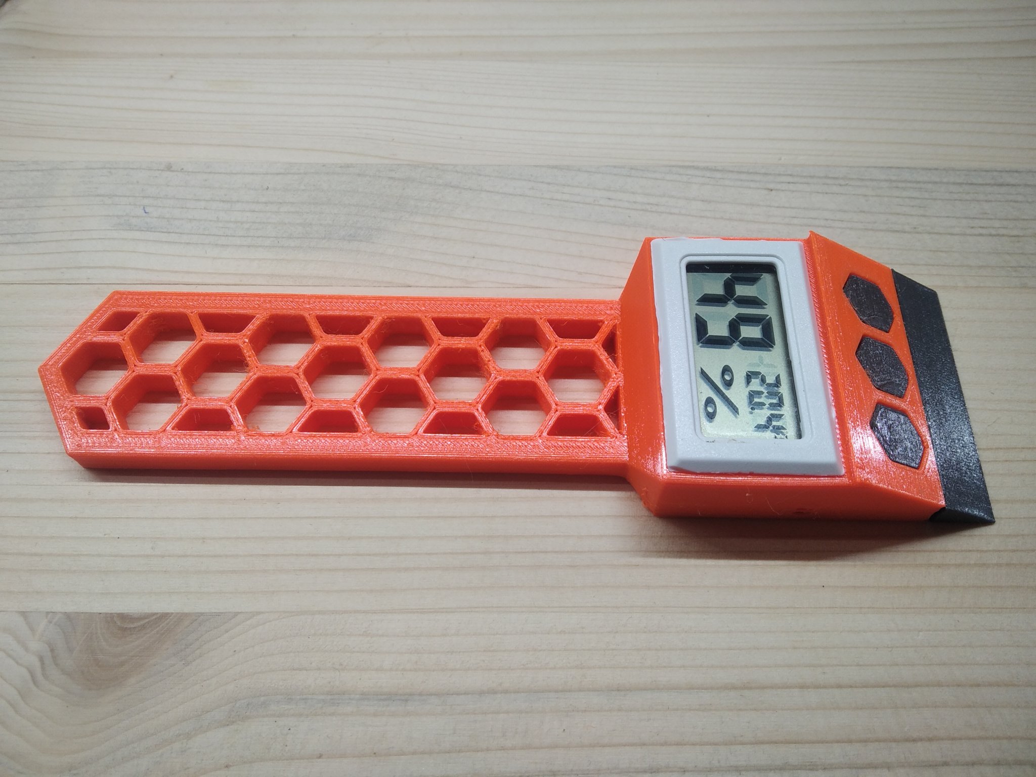 Dụng cụ cạo băng HEX tích hợp cảm biến nhiệt độ và độ ẩm