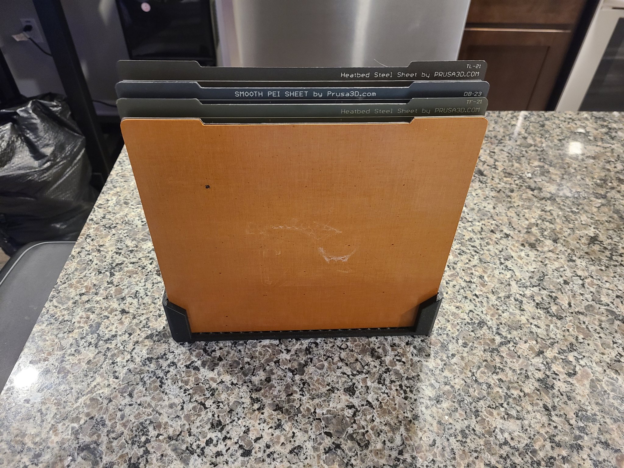 4 Piece build plate holder with bigger, offset slot