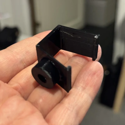 Giá đỡ webcam trên chân máy ảnh