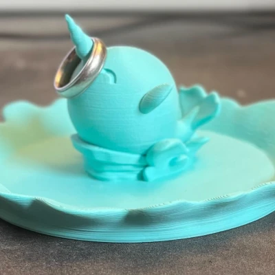 Mô Hình Kỳ Lân Biển Dễ Thương Và Giá Đỡ Nhẫn