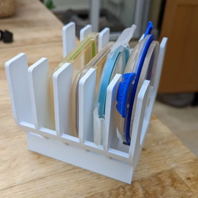 Giá Đỡ Nắp Hộp Tupperware (Tổ Chức Nhà Bếp)