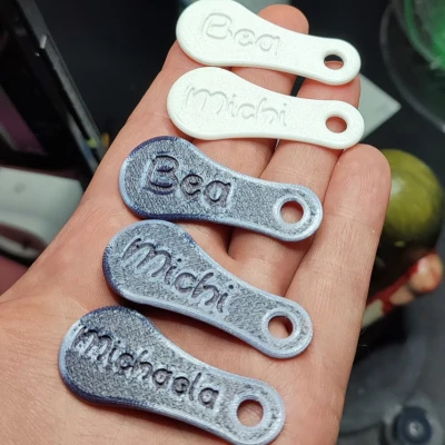 Móc khóa xe đẩy hàng