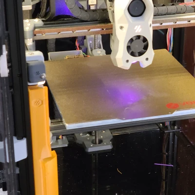 Voron Trident: Chắn Trục Vít Tải kiêm Đế Gắn Đèn LED Trước