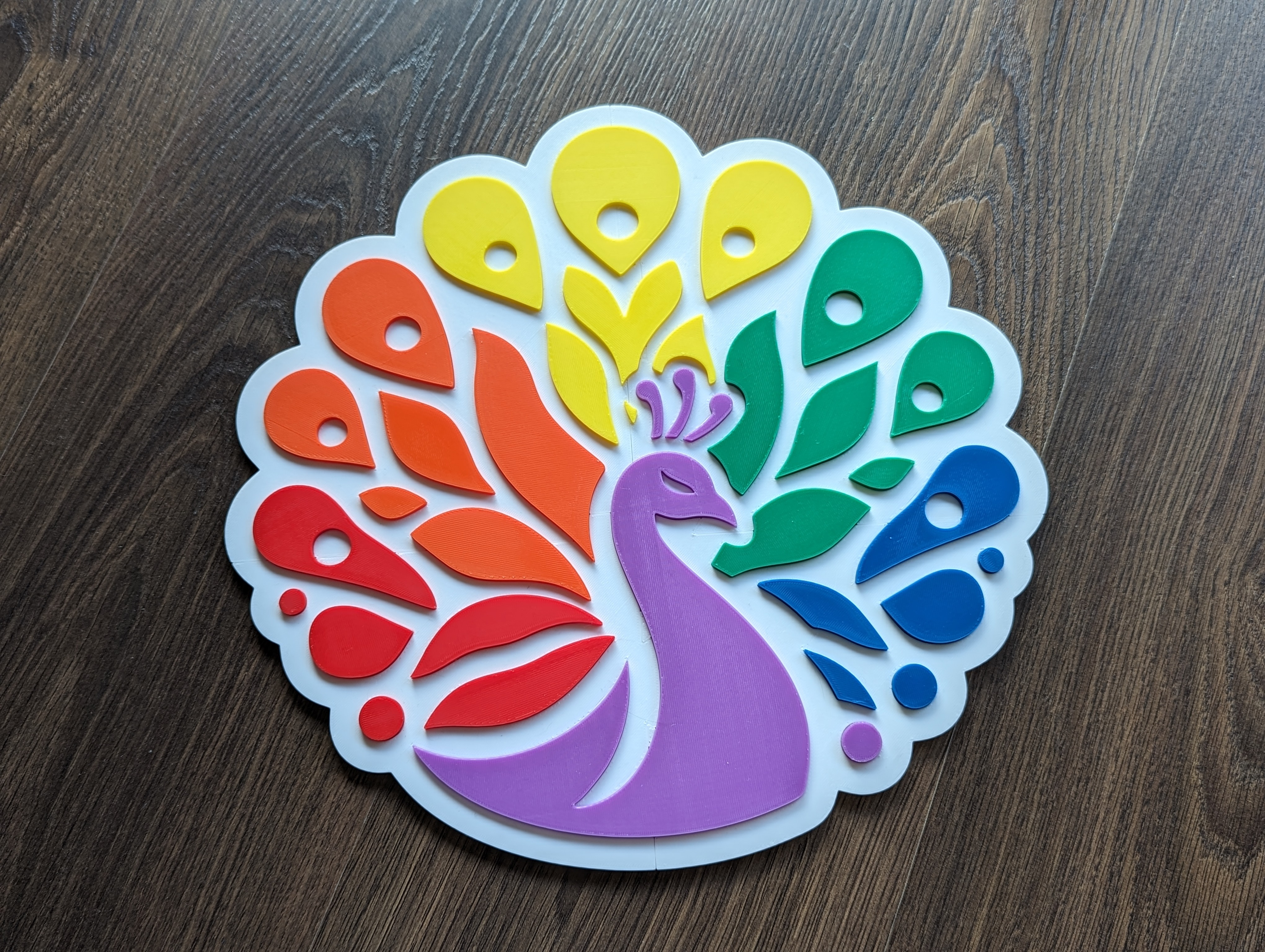 Logo Chim Công Tái Hiện Đầy Sắc Màu