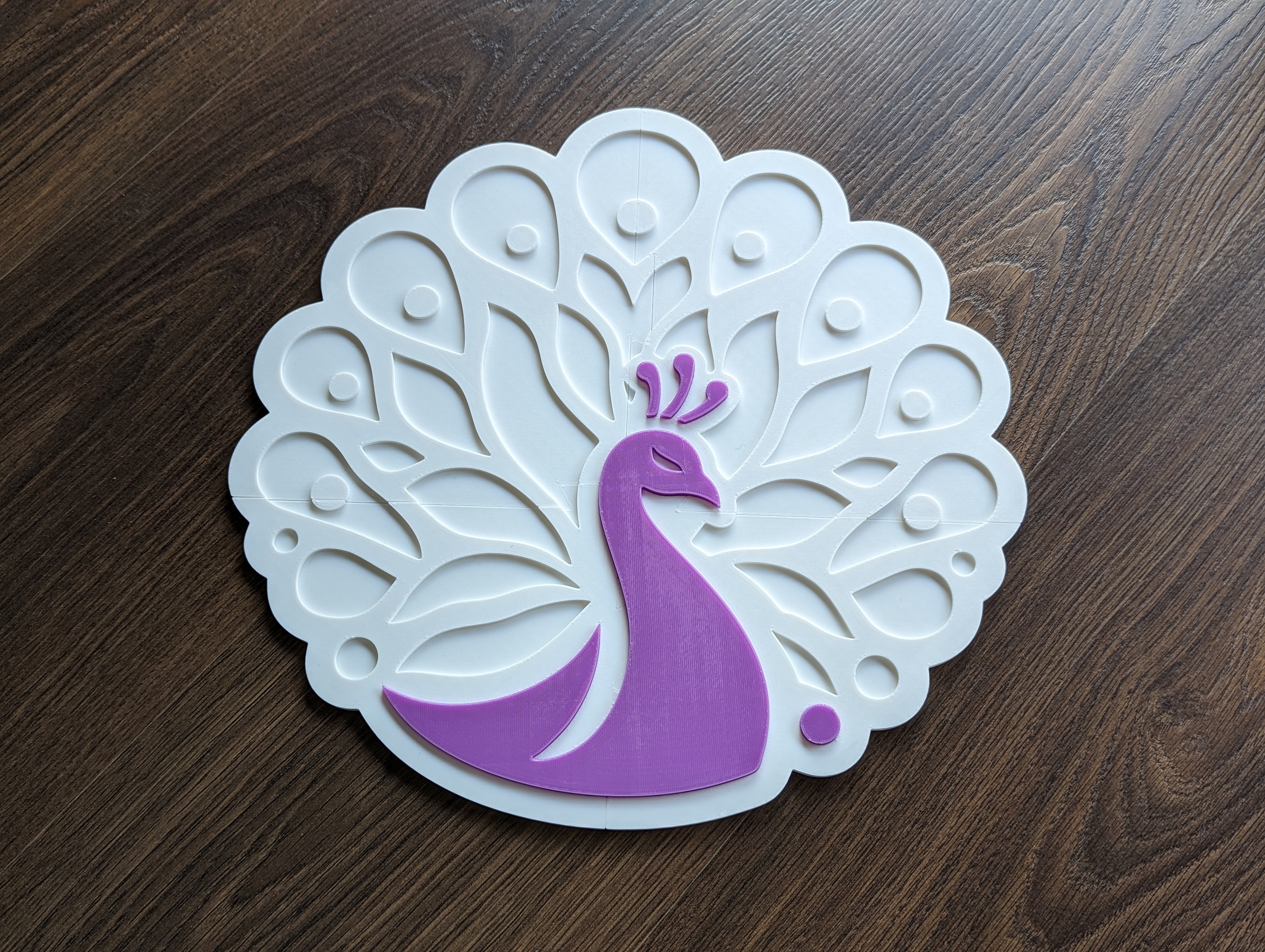 Logo Chim Công Tái Hiện Đầy Sắc Màu