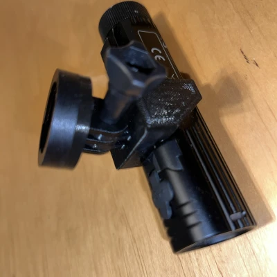 Pat Gắn Đèn Pin Fenix BC26R Cho Đế Garmin