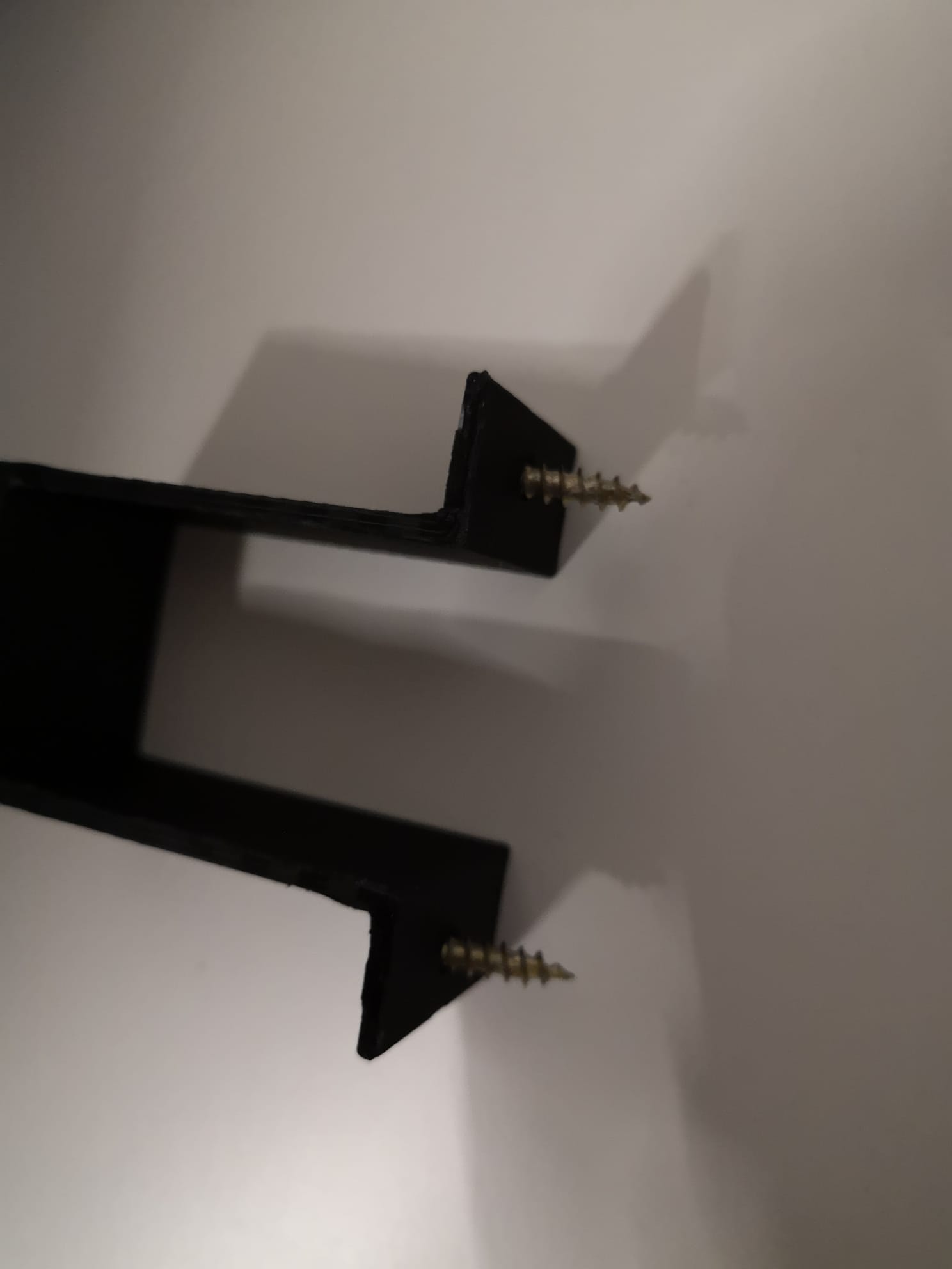 Giá Đỡ Cục Sạc Laptop