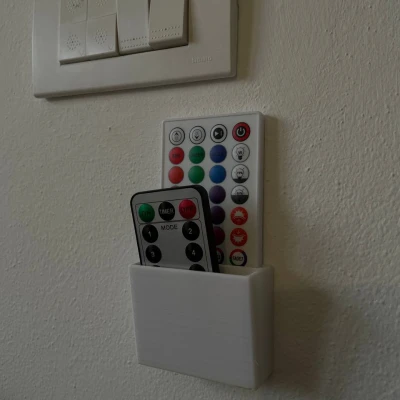 Giá treo remote dán tường