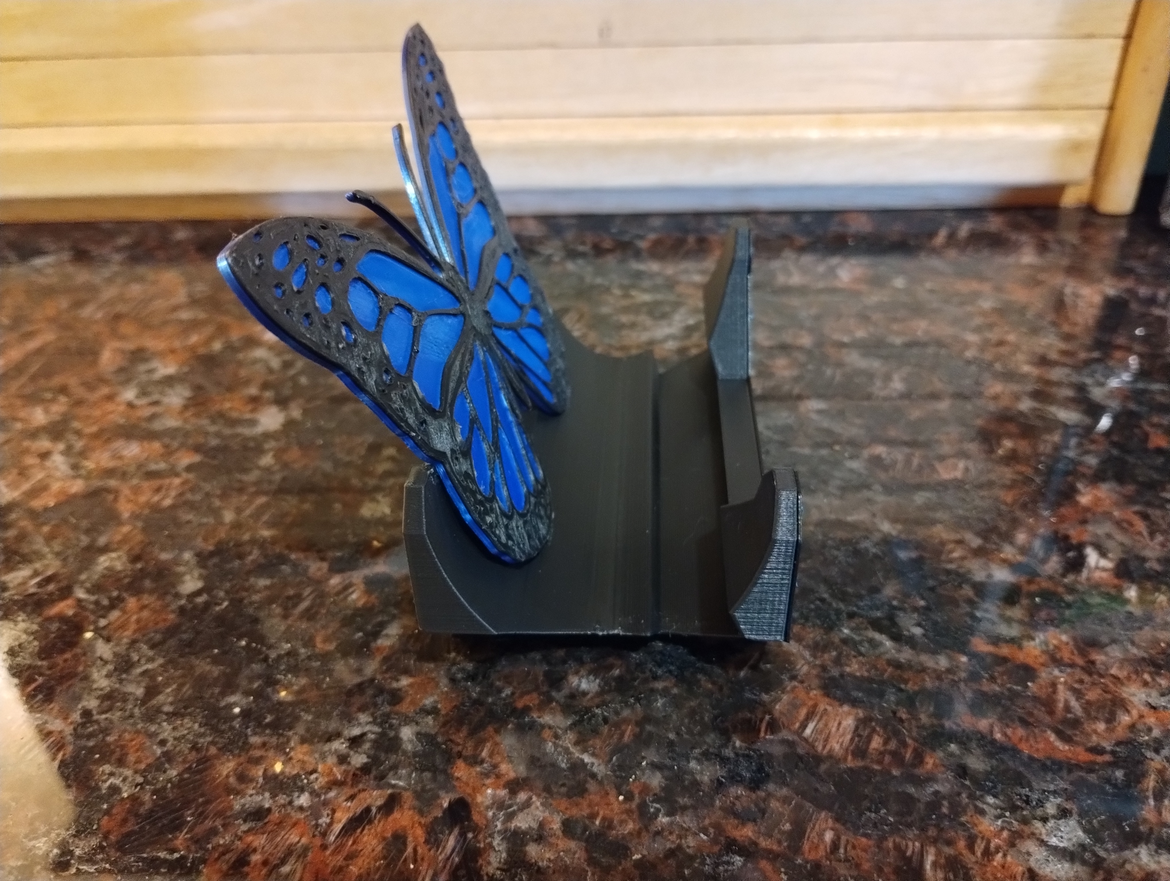 Chân Đế Điện Thoại Hình Con Bướm