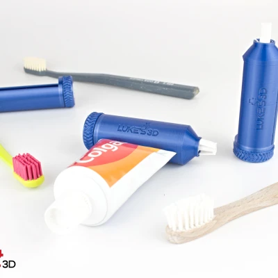 Dụng cụ bóp tuýp kem đánh răng dạng bánh răng