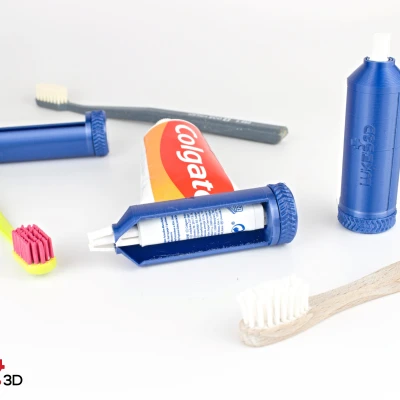 Dụng cụ bóp tuýp kem đánh răng dạng bánh răng