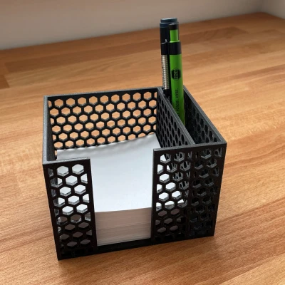 Kệ chặn giấy kiêm chỗ cắm bút