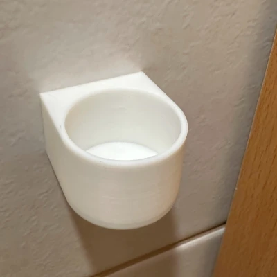 Kệ dán tường cho tuýp kem đánh răng Sensodyne