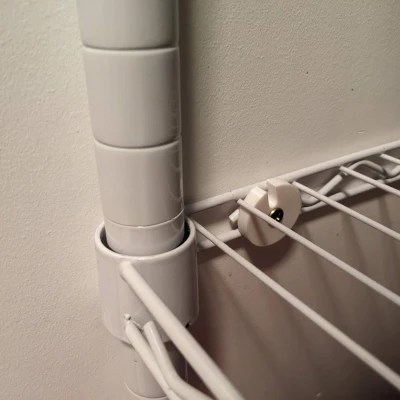 Cổ áo neo tường cho kệ dây