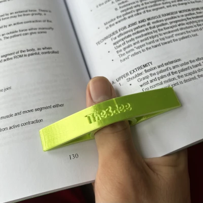 Dụng cụ giữ trang sách bằng ngón tay cái