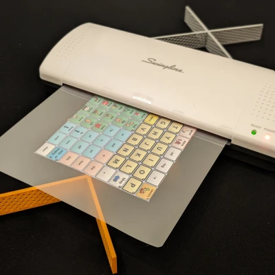 Giá Đỡ Giấy Máy Ép Plastic