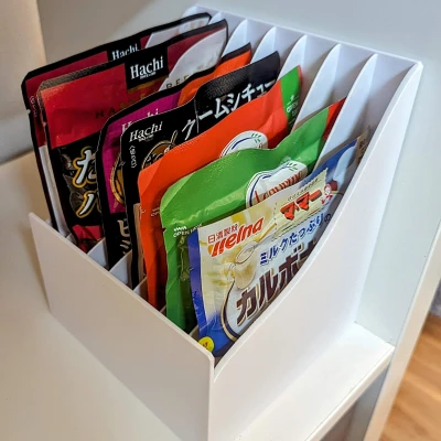 Hộp đựng túi thực phẩm (Retort, MRE, thức ăn cho mèo, v.v.). Thiết kế cong giúp túi trượt vào dễ dàng