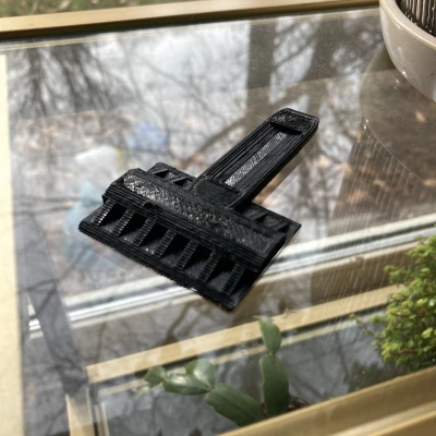 Dụng Cụ Cào Đá Trên Gương Chiếu Hậu Xe Hơi