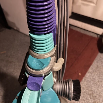 Lẫy Nhả Ống Hút Cho Máy Hút Bụi Dyson DC07