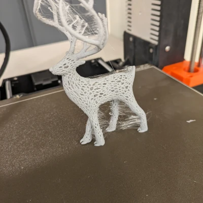 Móc khóa tuần lộc Rudolph mũi đỏ kiểu Voronoi có móng