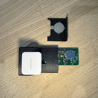 Vỏ Đẩy Nút SwitchBot cho Remote Cửa Gara/Cổng LiftMaster 811LM