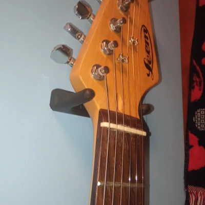 Giá treo đàn ghi-ta