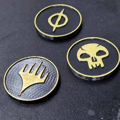 Tiền xu MTG 5 màu và Phyrexian