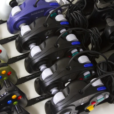 Giá đỡ tay cầm chơi game module cho nhiều hệ máy