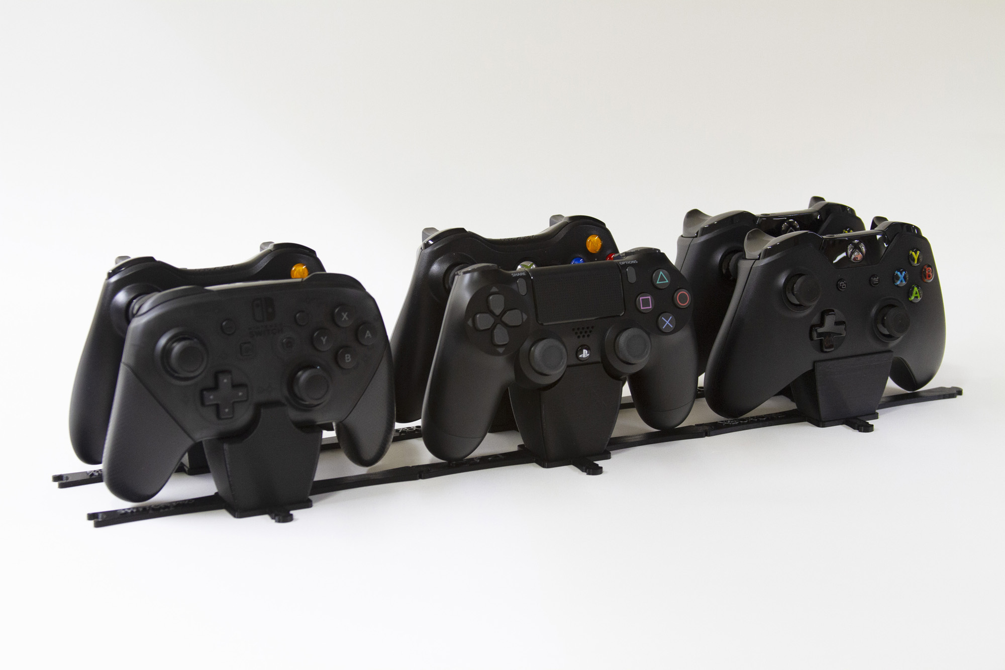 Giá đỡ tay cầm chơi game module cho nhiều hệ máy