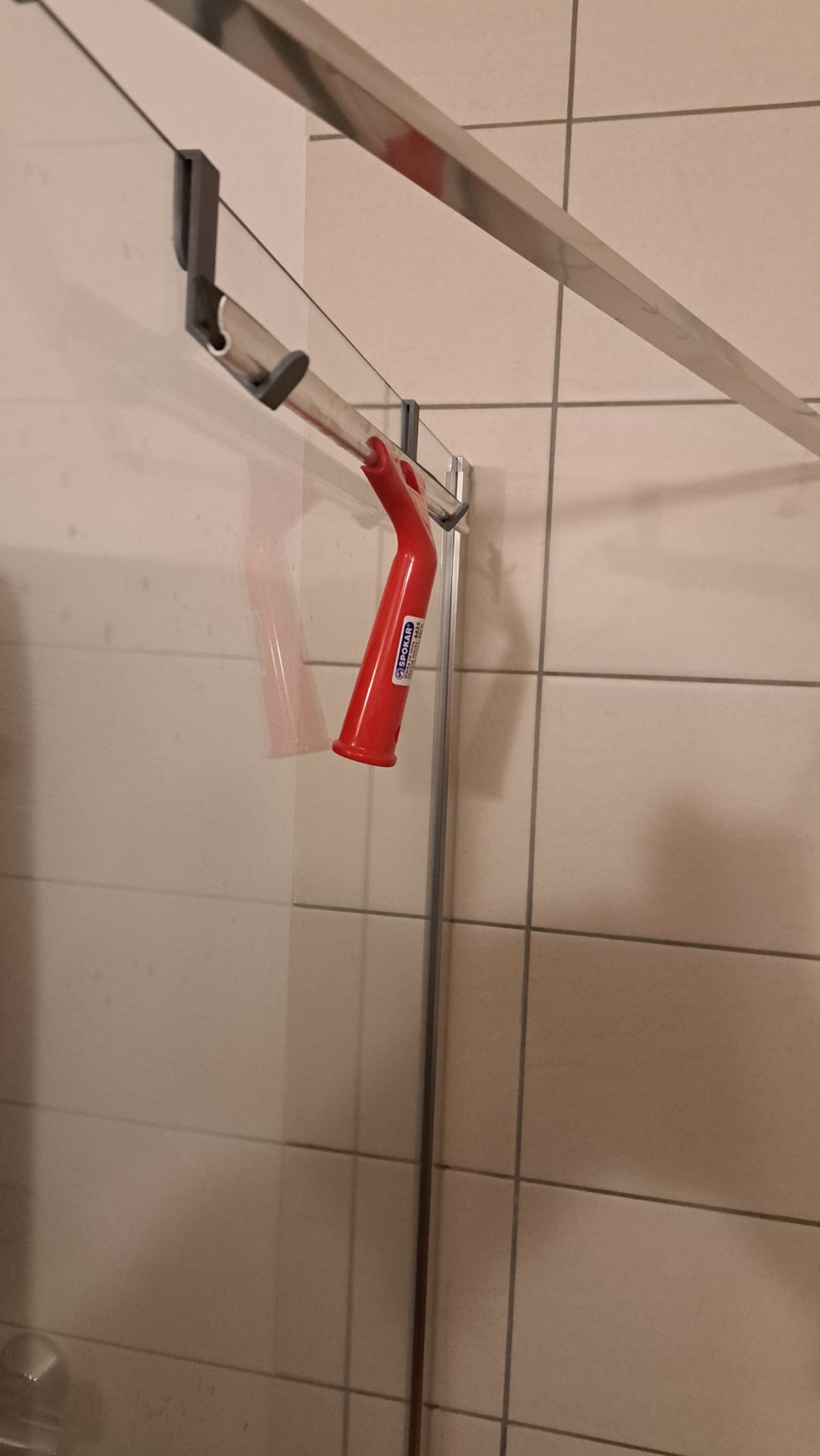 Giá Đỡ Gạt Kính Phòng Tắm