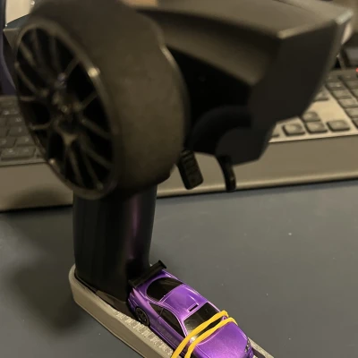 Đế sạc kiêm cất giữ bộ điều khiển Turbo Racing (Không cần keo)