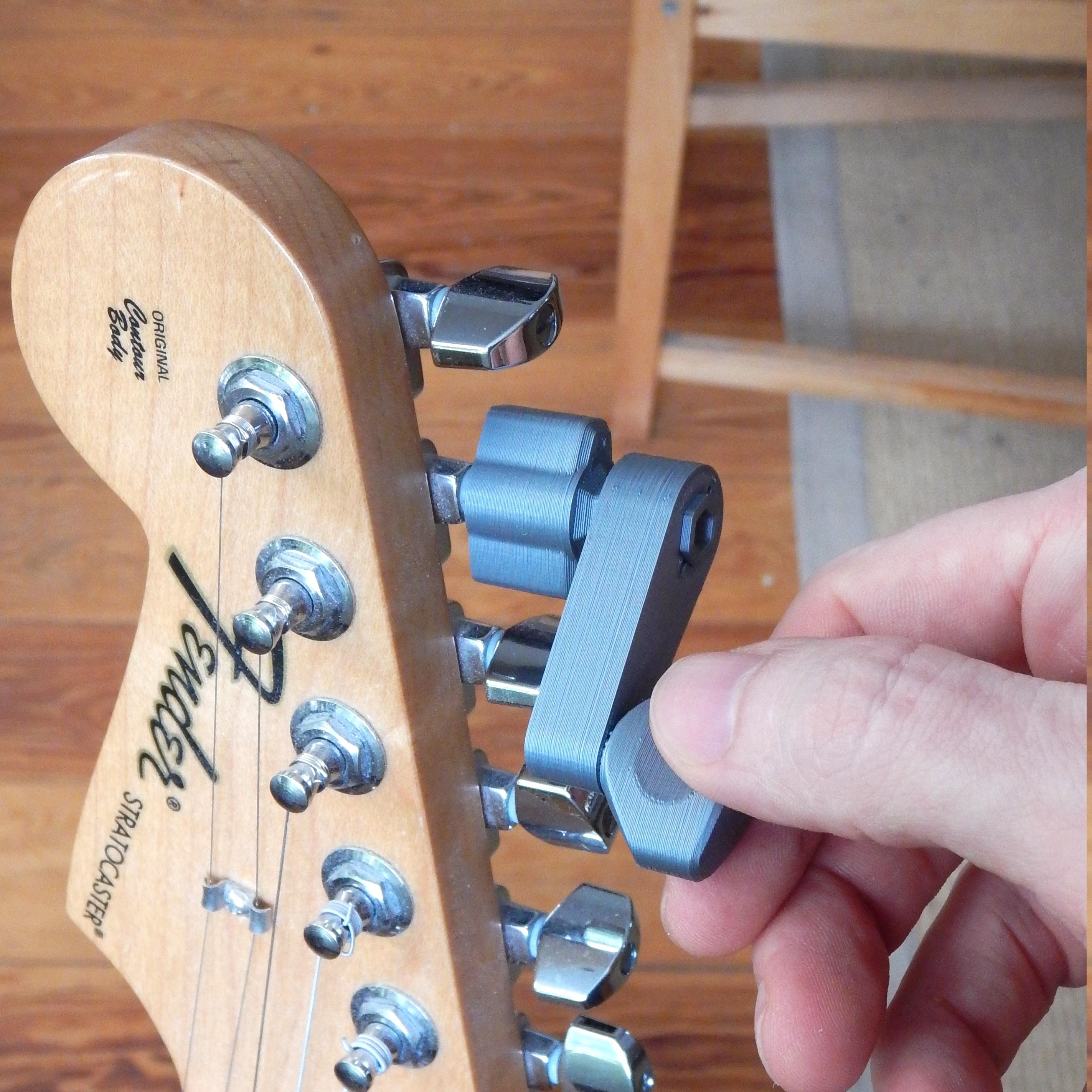 Dụng cụ cuốn dây đàn guitar