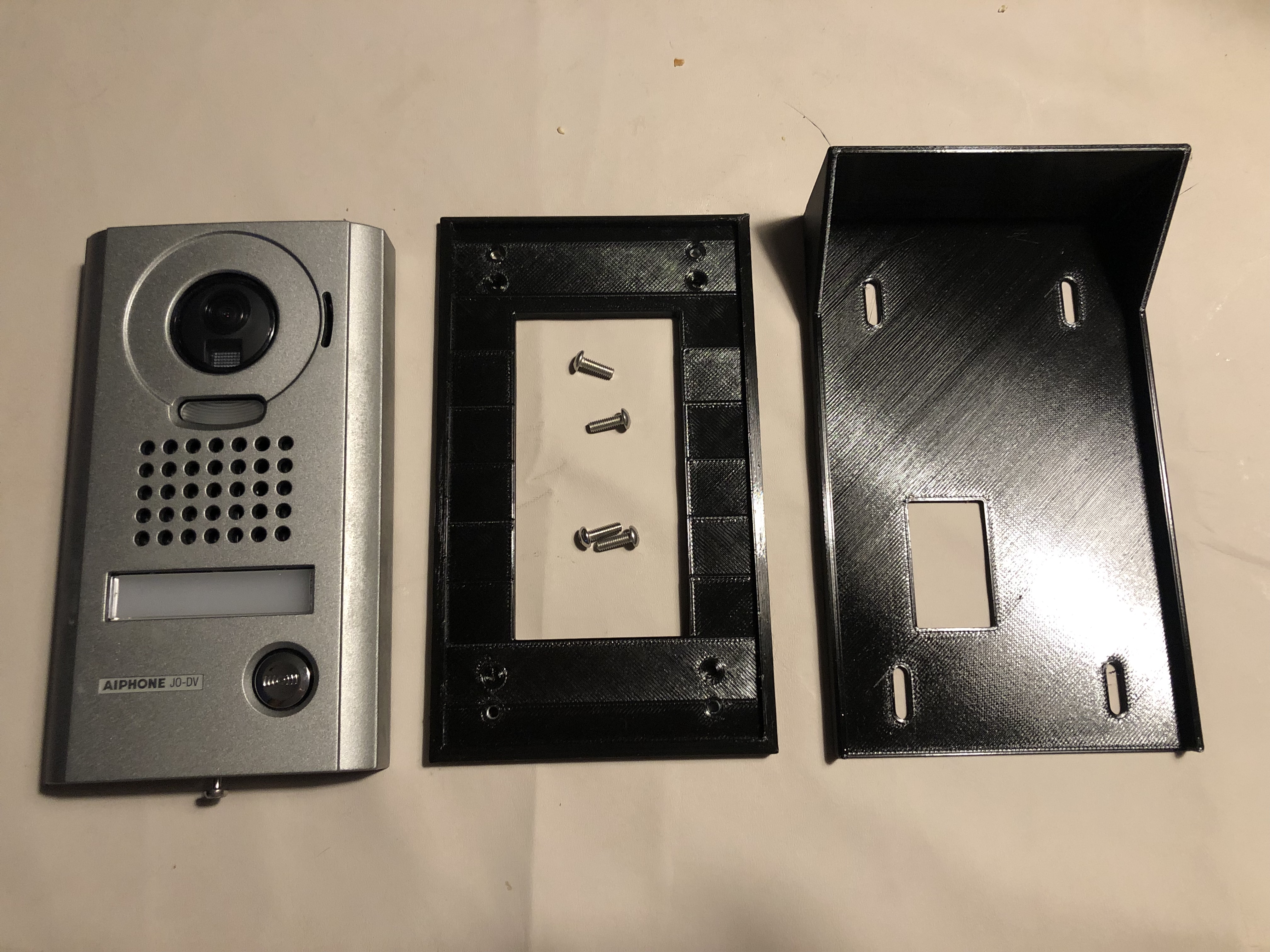 Chân đế nghiêng và che mưa cho Hệ thống chuông cửa có hình AIPHONE