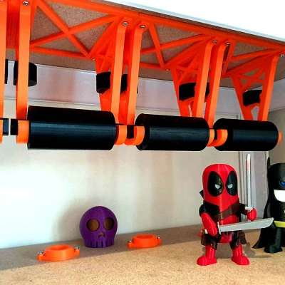 Giá đỡ cuộn dây tự thu dưới gầm kệ MMU