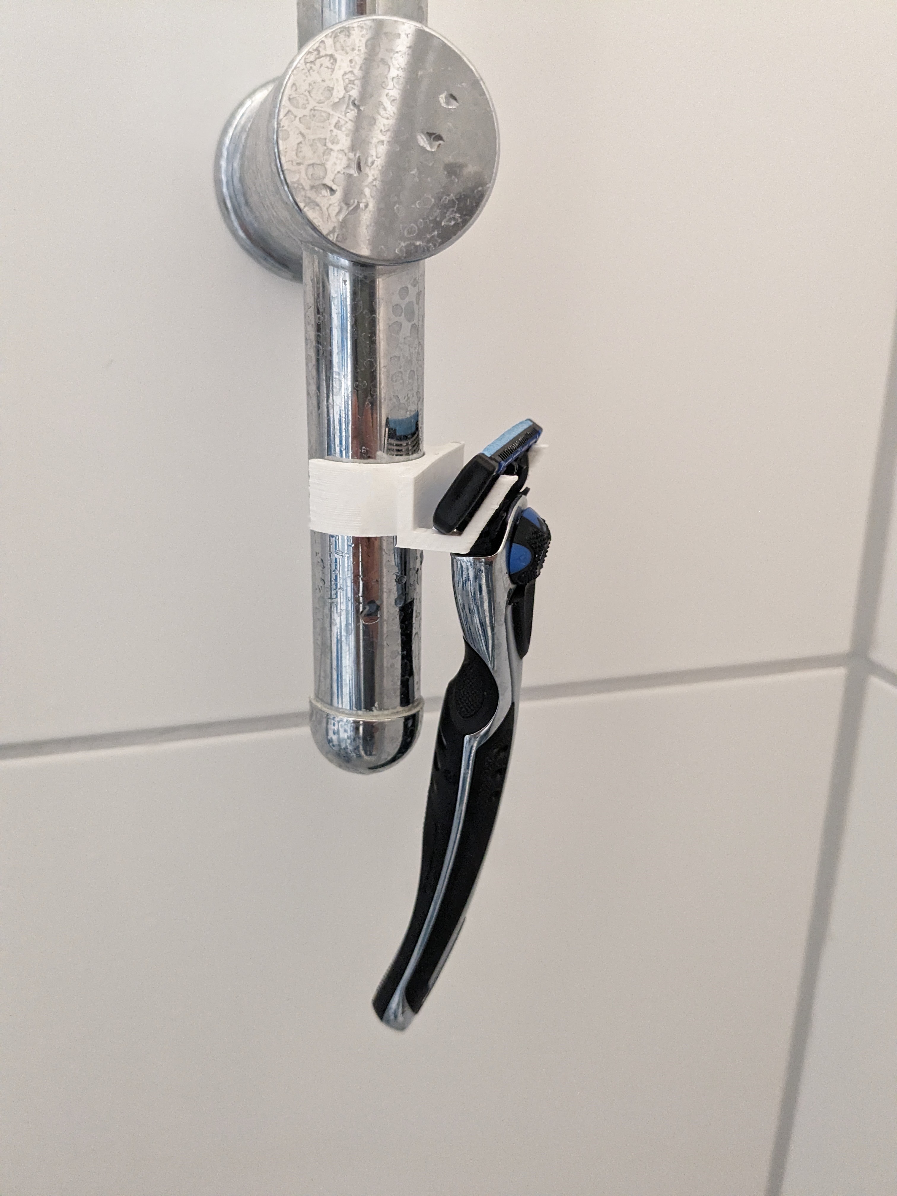 Giá đỡ dao cạo dùng trong phòng tắm